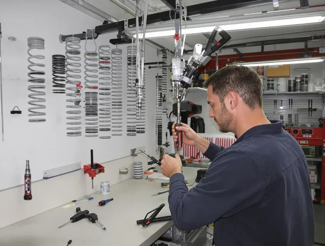 Westminster Garage Door Repair safety certified technician performing precision spring replacement in Westminster